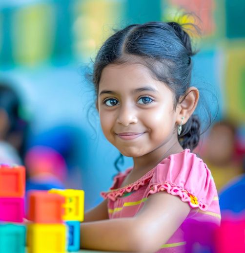Happy preschool children learning together